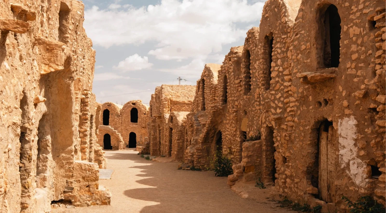 Courtyard of a four-storey ksar near Tataouine with rows of granary cells