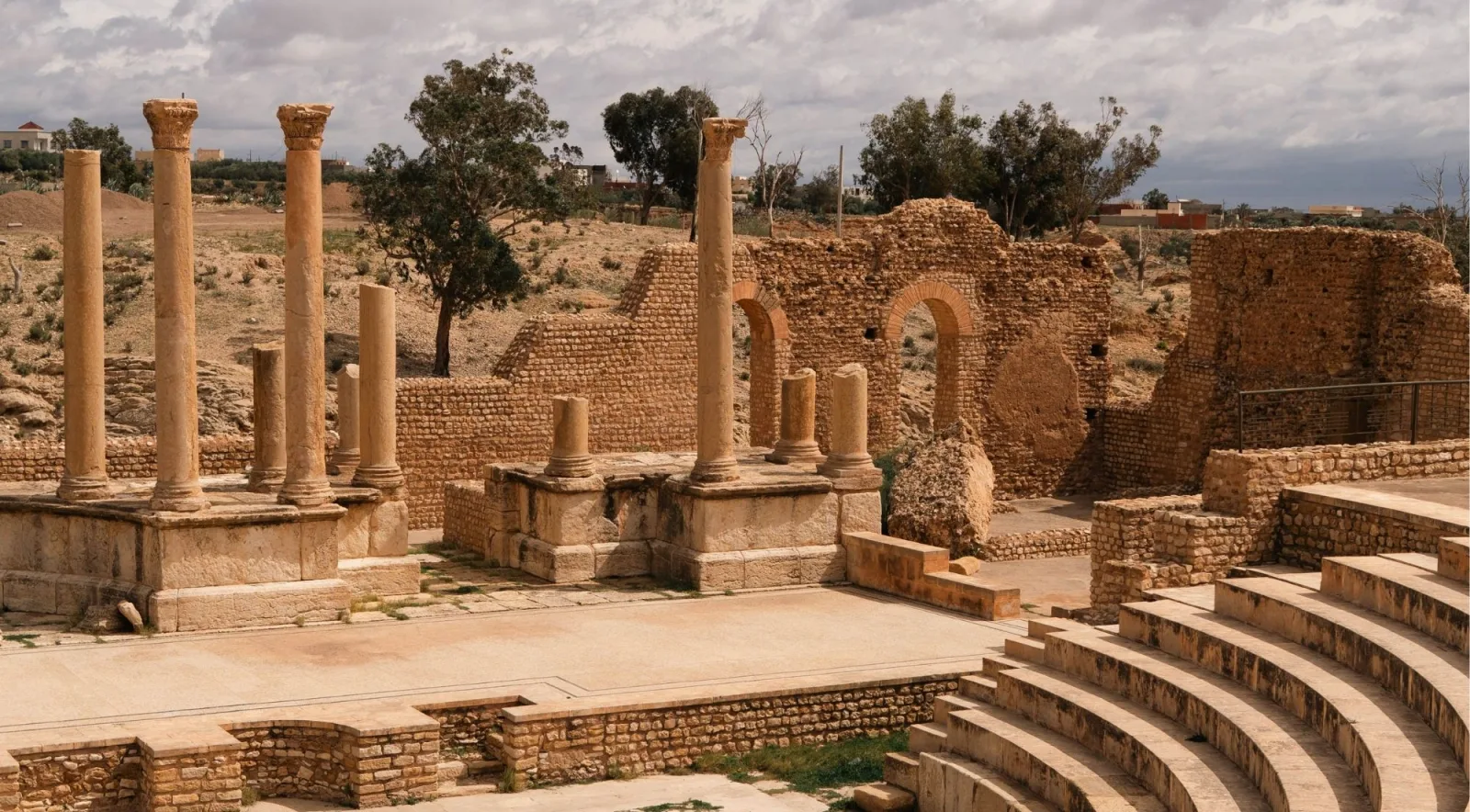 Roman columns and stepped seating at a ruined site in inland Tunisia