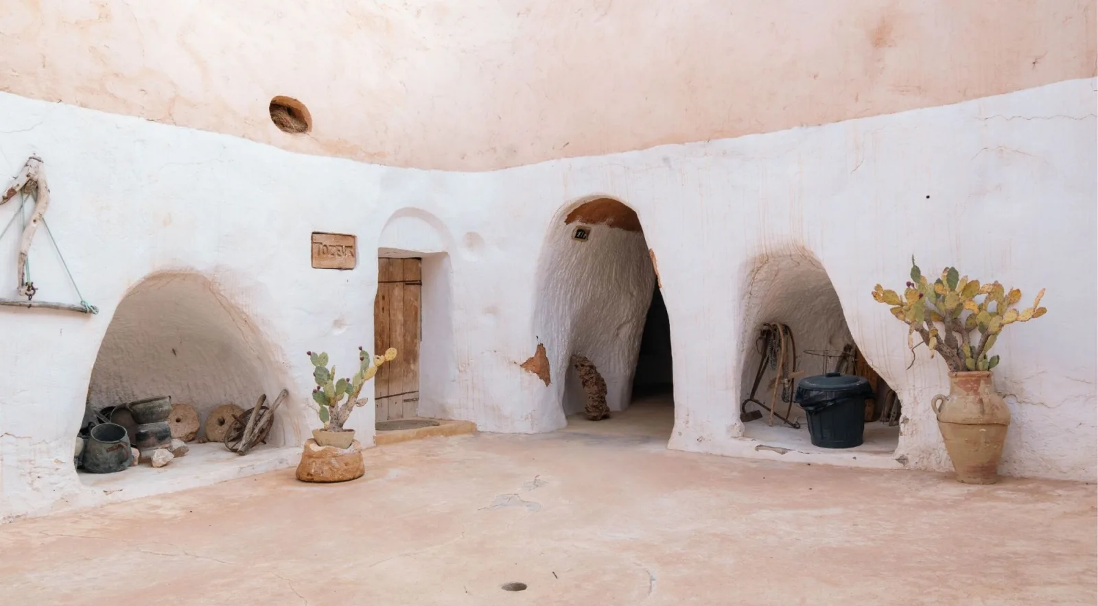 Sunken courtyard of a troglodyte cave house at Matmata