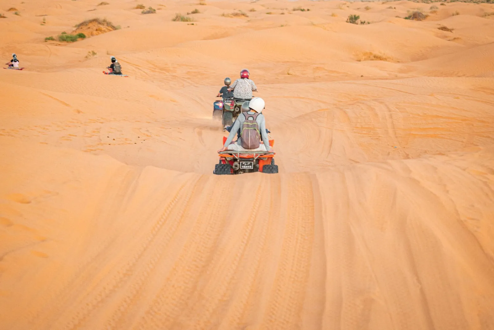 A quad bike crossing the dunes