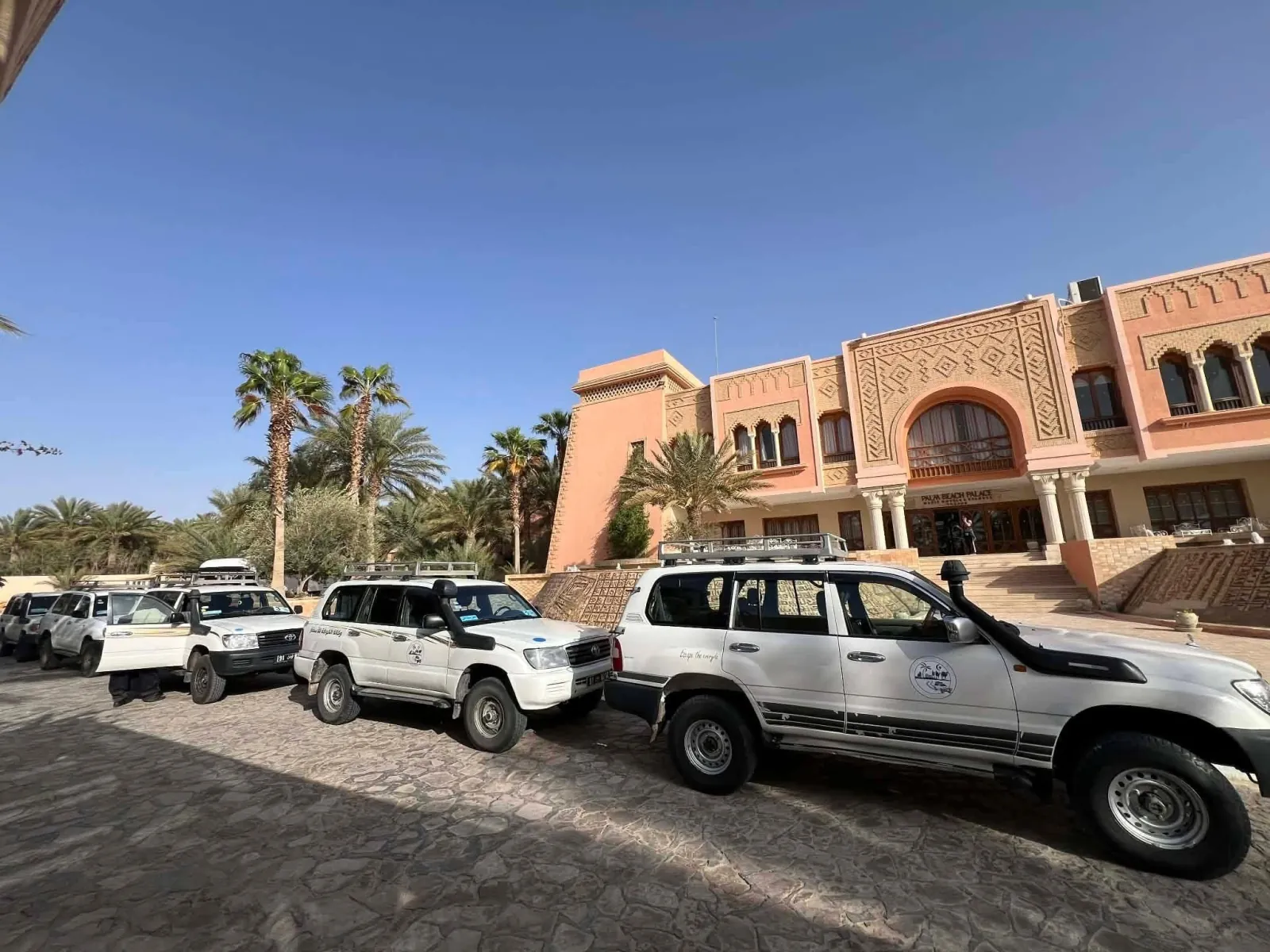 4x4s lined up outside a Tozeur hotel before the tour