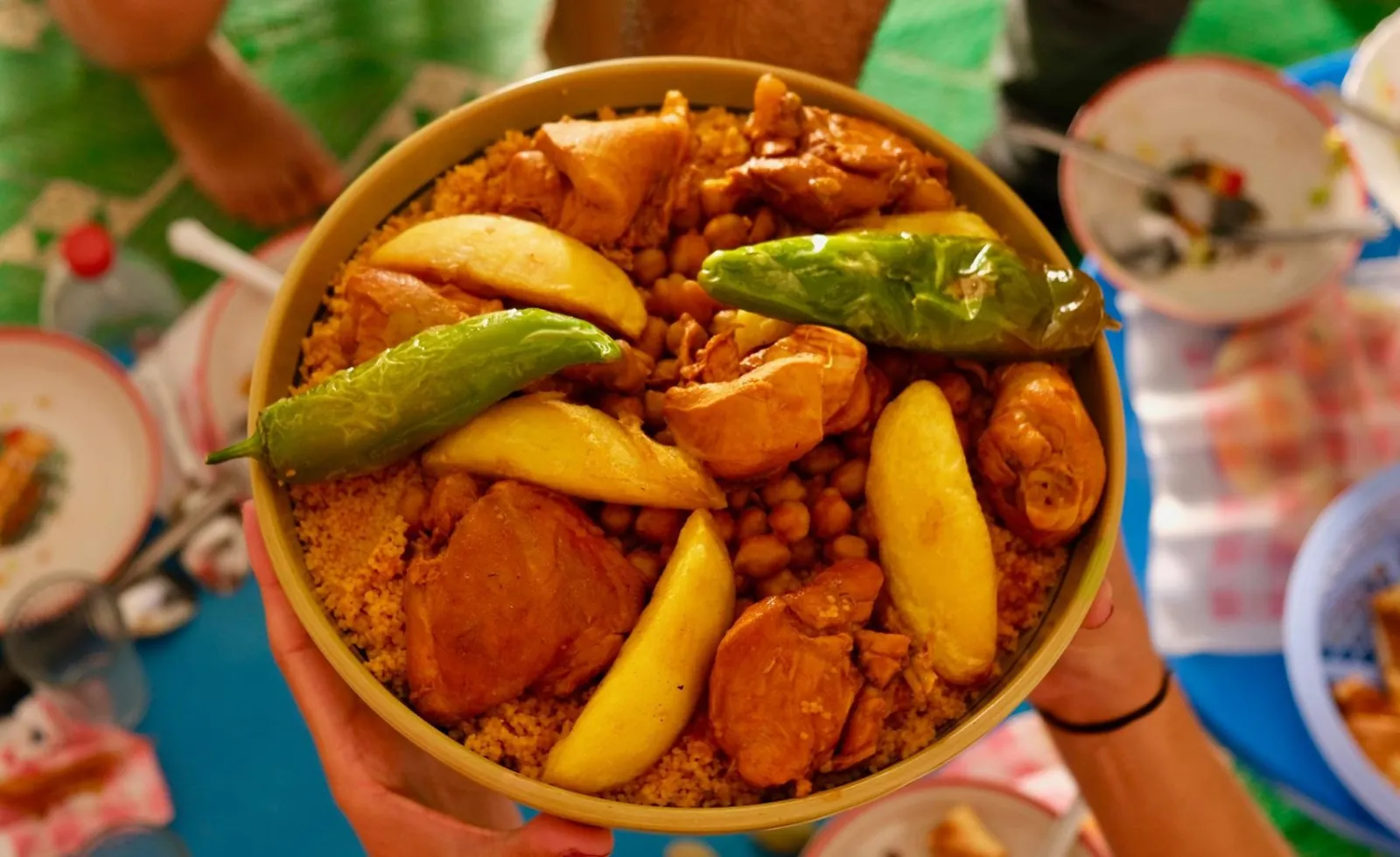 A bowl of Tunisian couscous shared at a lunch stop